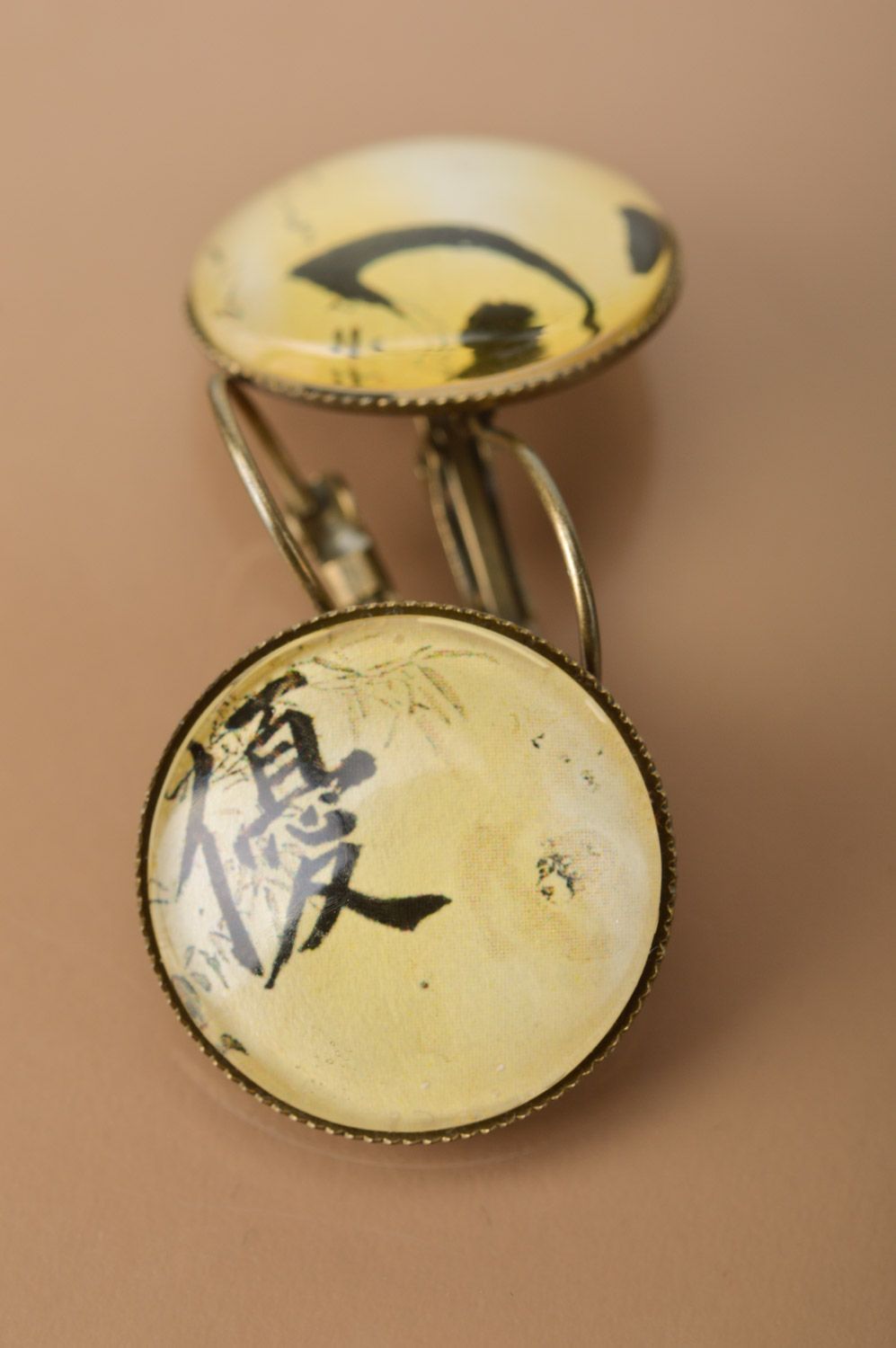 Handmade designer metal dangle earrings of round shape with print Hieroglyphs   photo 5