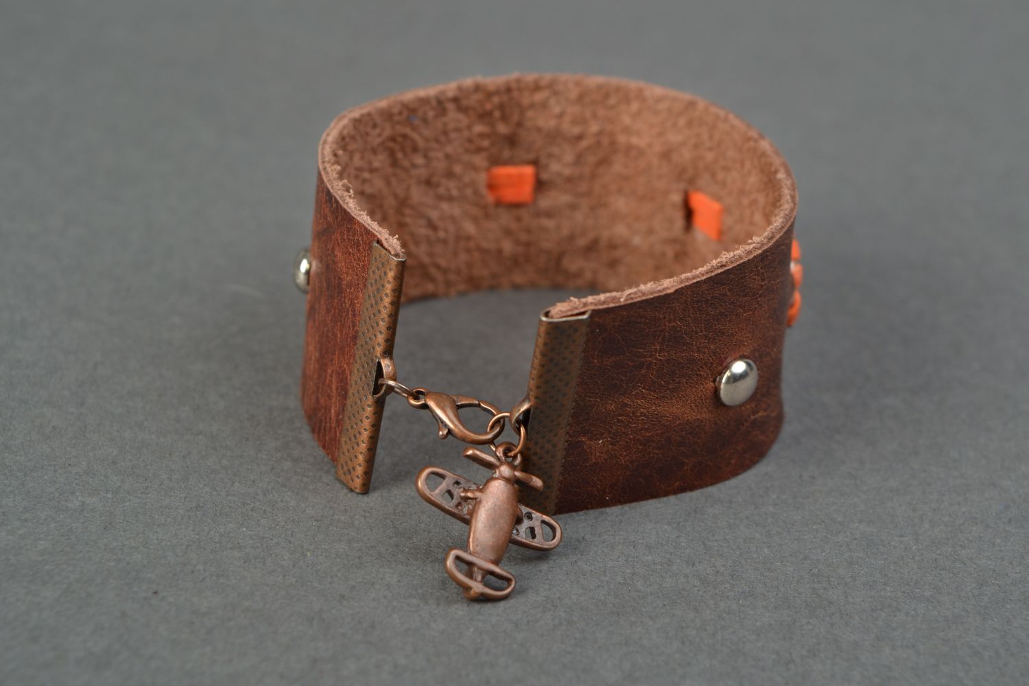 Brown genuine leather bracelet with metal inserts  photo 4