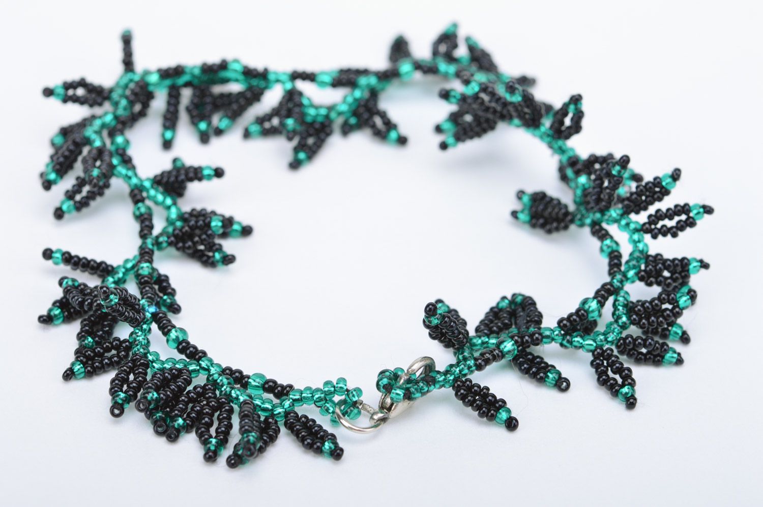 Handmade designer wrist bracelet woven of black and green Czech beads Leaves photo 3