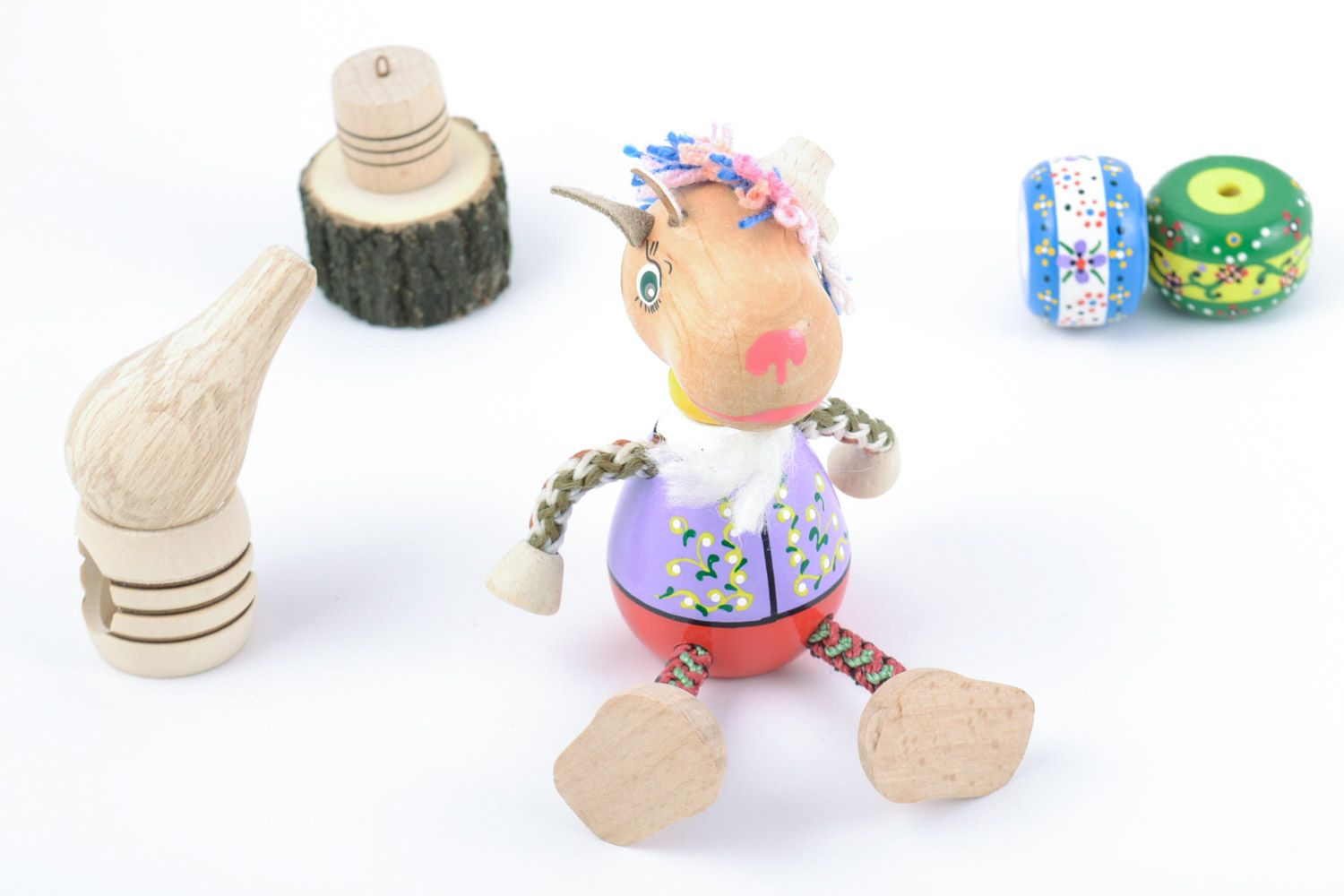 Cute painted with eco dyes wooden toy goat handmade for children and interior photo 1