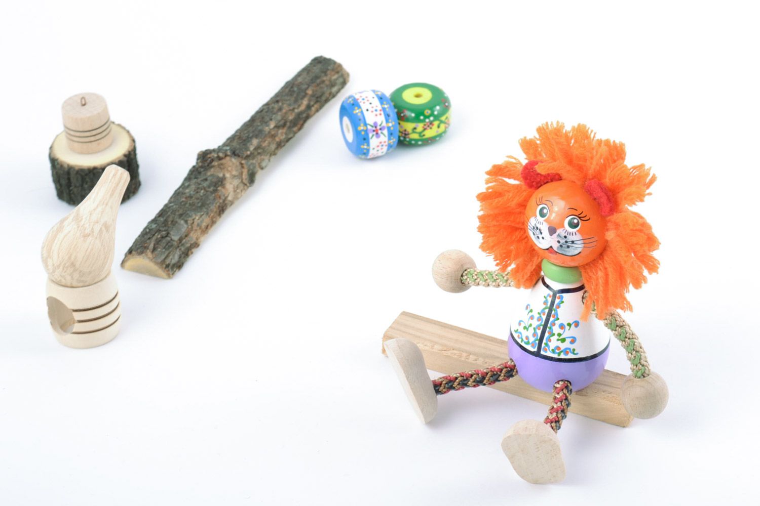 Small eco friendly painted toy hand made of wood lion with orange mane for kids photo 1