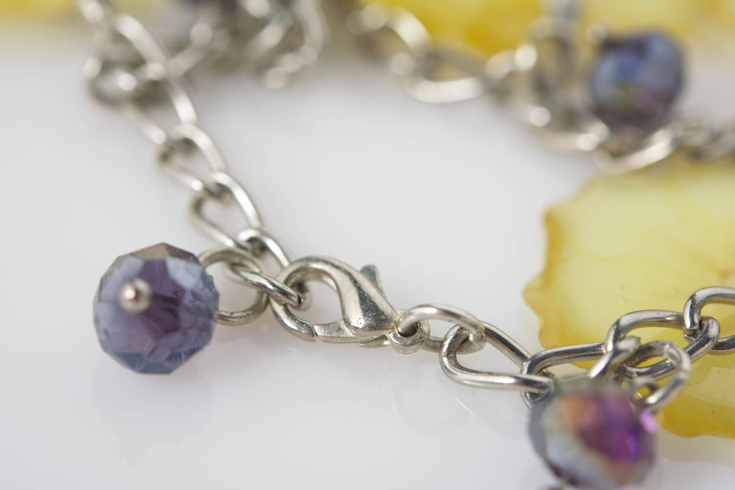 Handmade designer bracelet with rose petals in epoxy resin on metal chain photo 5
