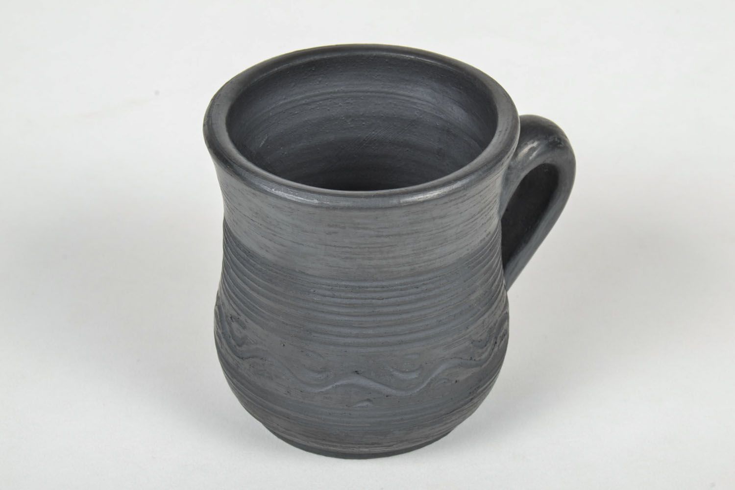 Large black smoked ceramic cup for coffee or tee with handle and rustic pattern photo 3