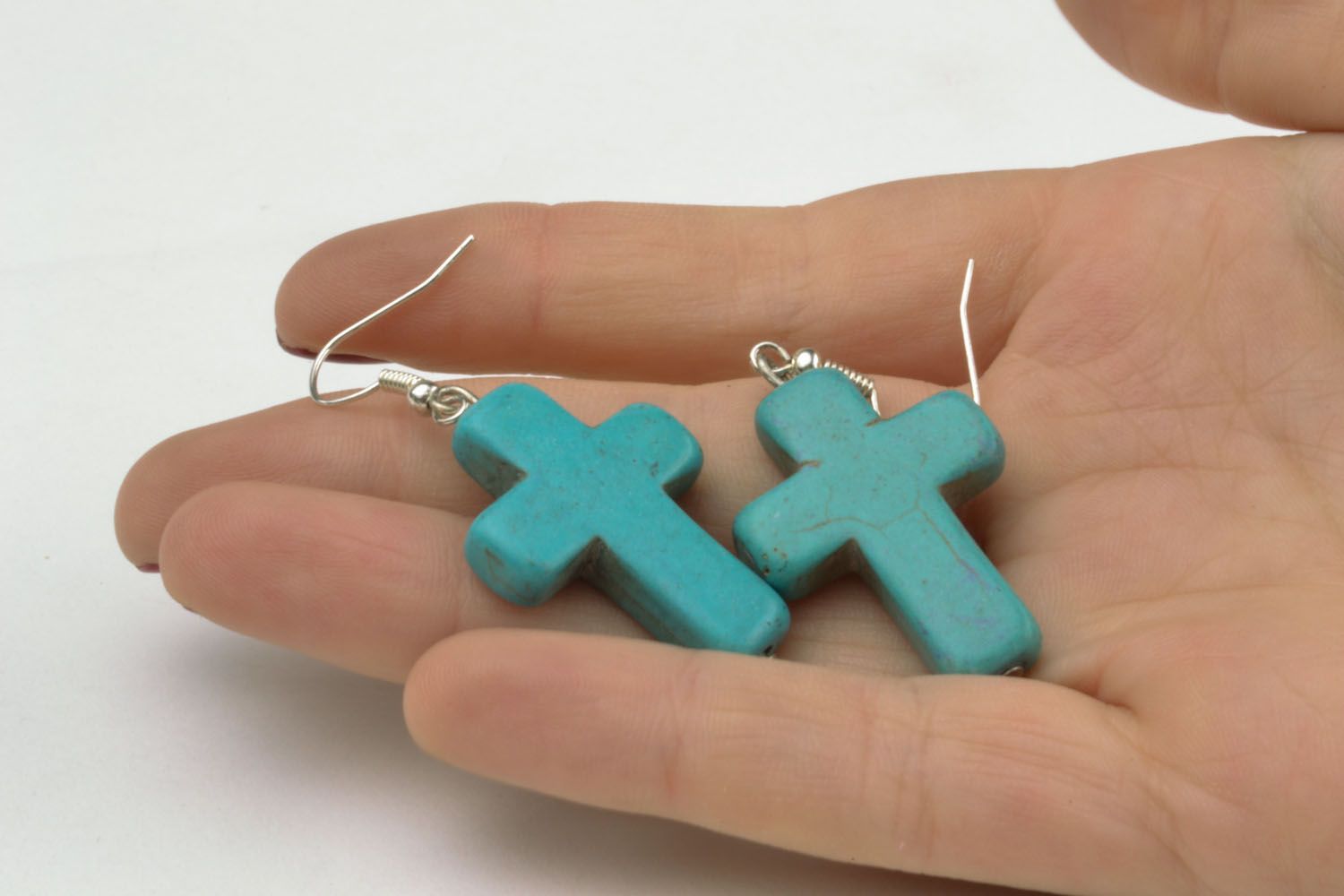 Fashion earrings in the form of crosses photo 2