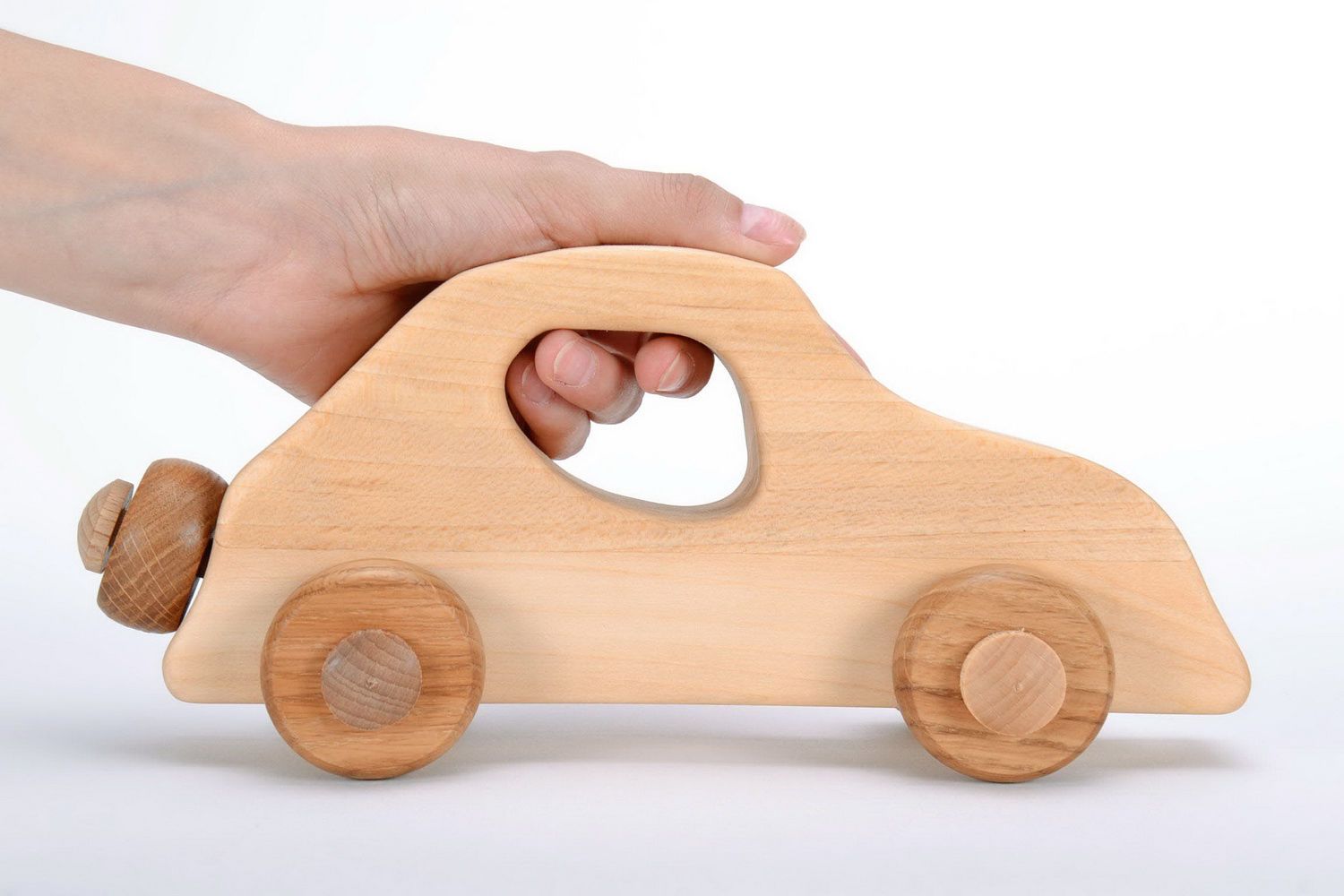 Wooden toy on wheels Car photo 4