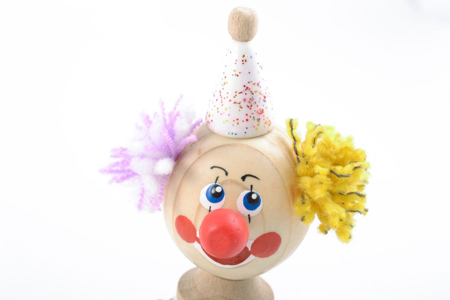 Bright designer homemade painted wooden toy in the shape of clown  photo 3