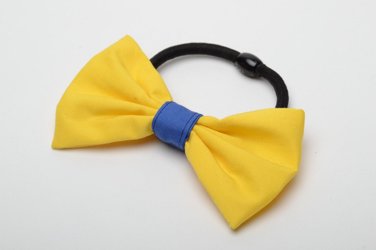 Handmade cotton fabric bow hair tie of yellow and blue colors photo 2