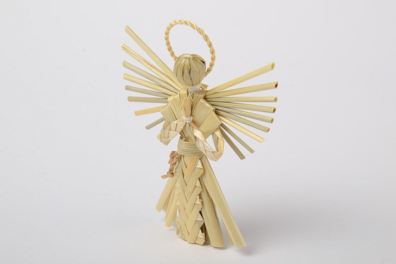 Small handmade figurine of angel woven of natural straw for interior decoration photo 2
