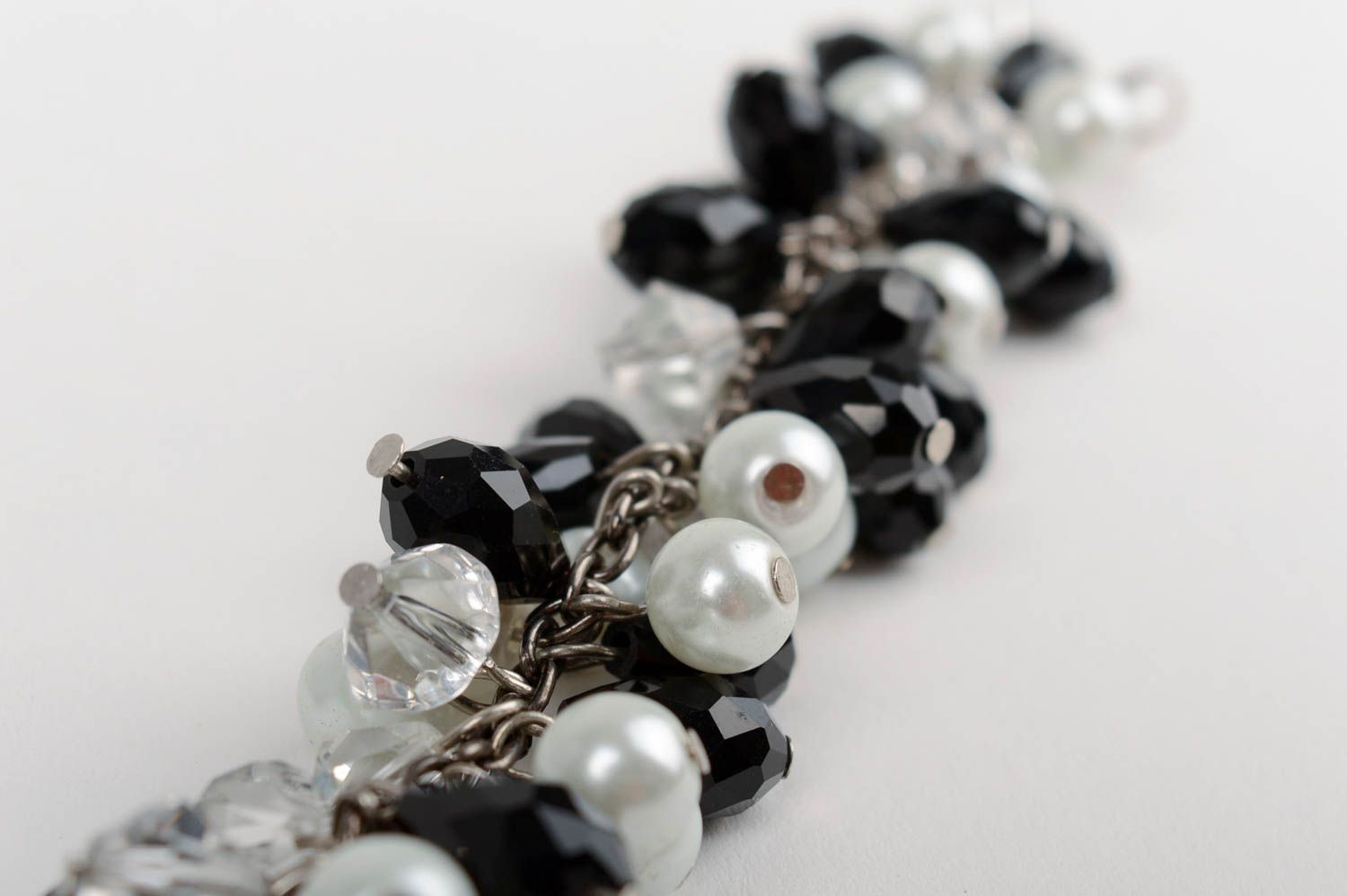 Handmade beautiful festive black and white wrist bracelet made of crystal beads  photo 4