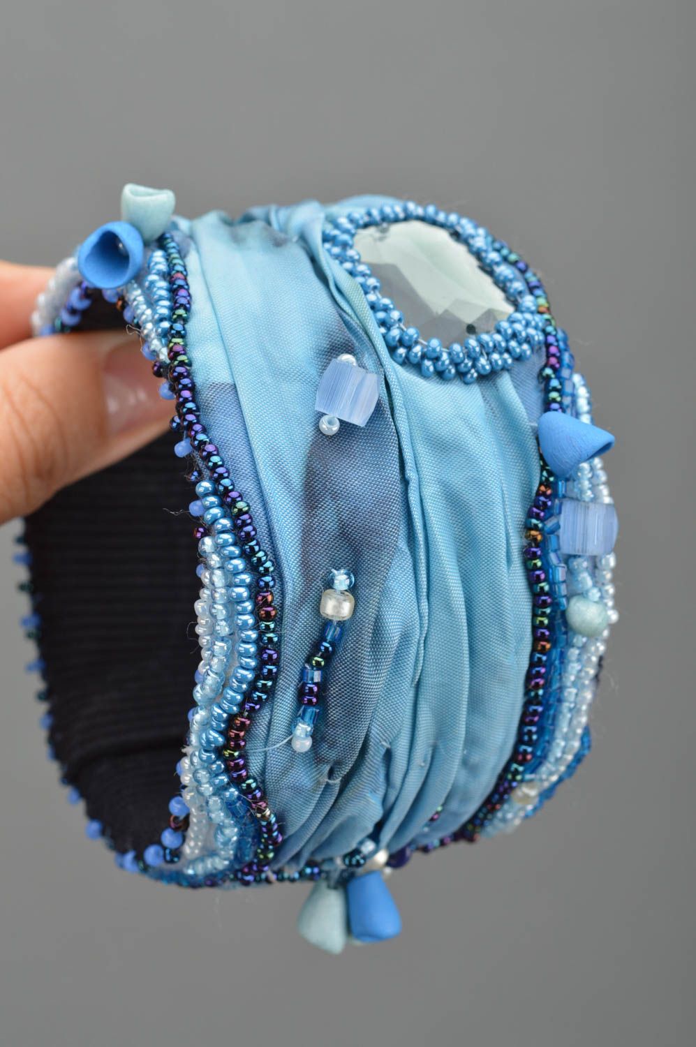 Handcrafted fabric massive handmade bracelet in blue color decorated with beads photo 2