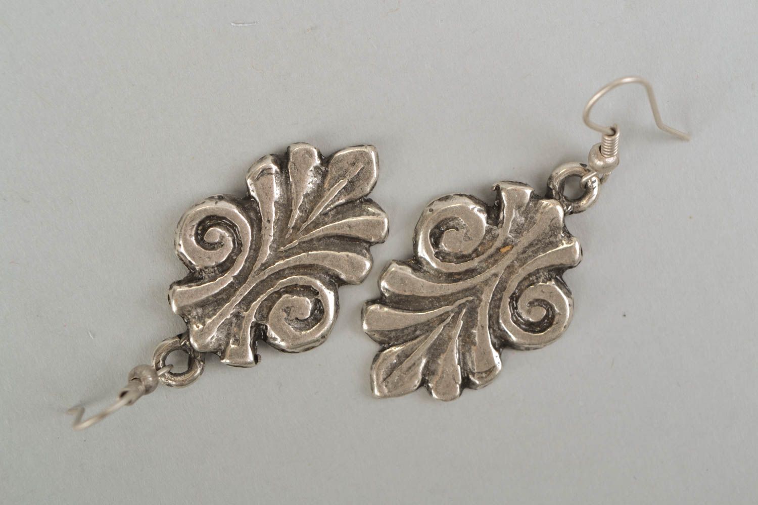Ethnic metal earrings of unusual shape photo 3