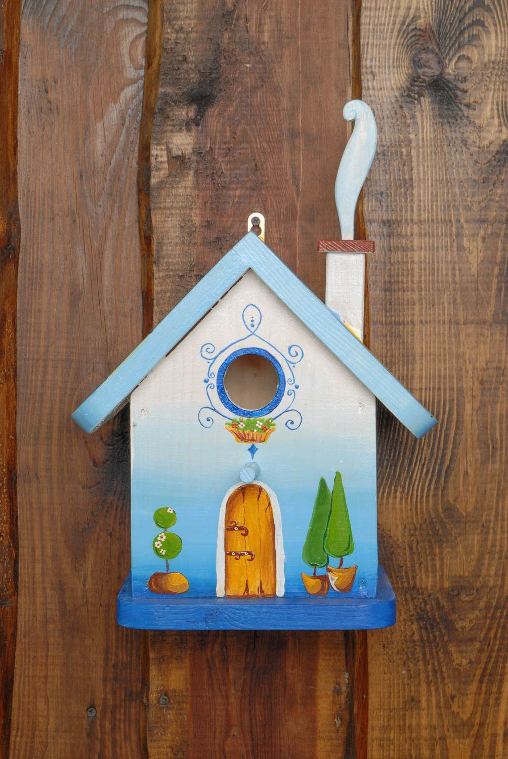 Handmade painted wooden birdhouse in the shape of forest house photo 3