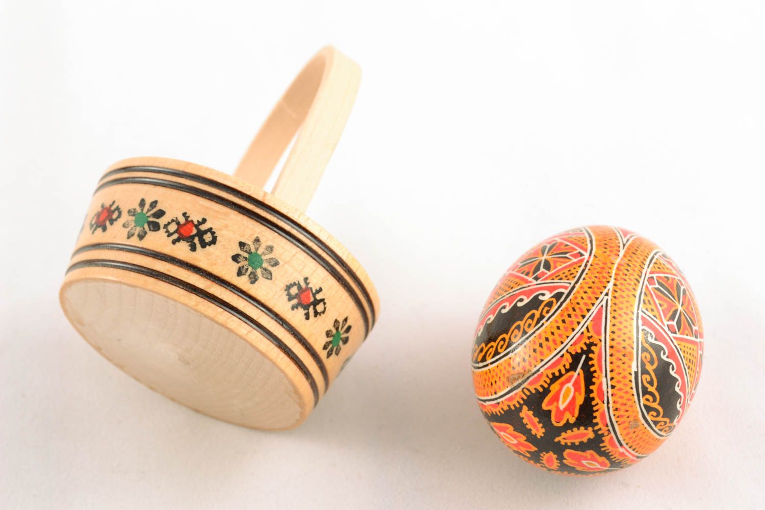 Painted egg in wooden basket photo 4