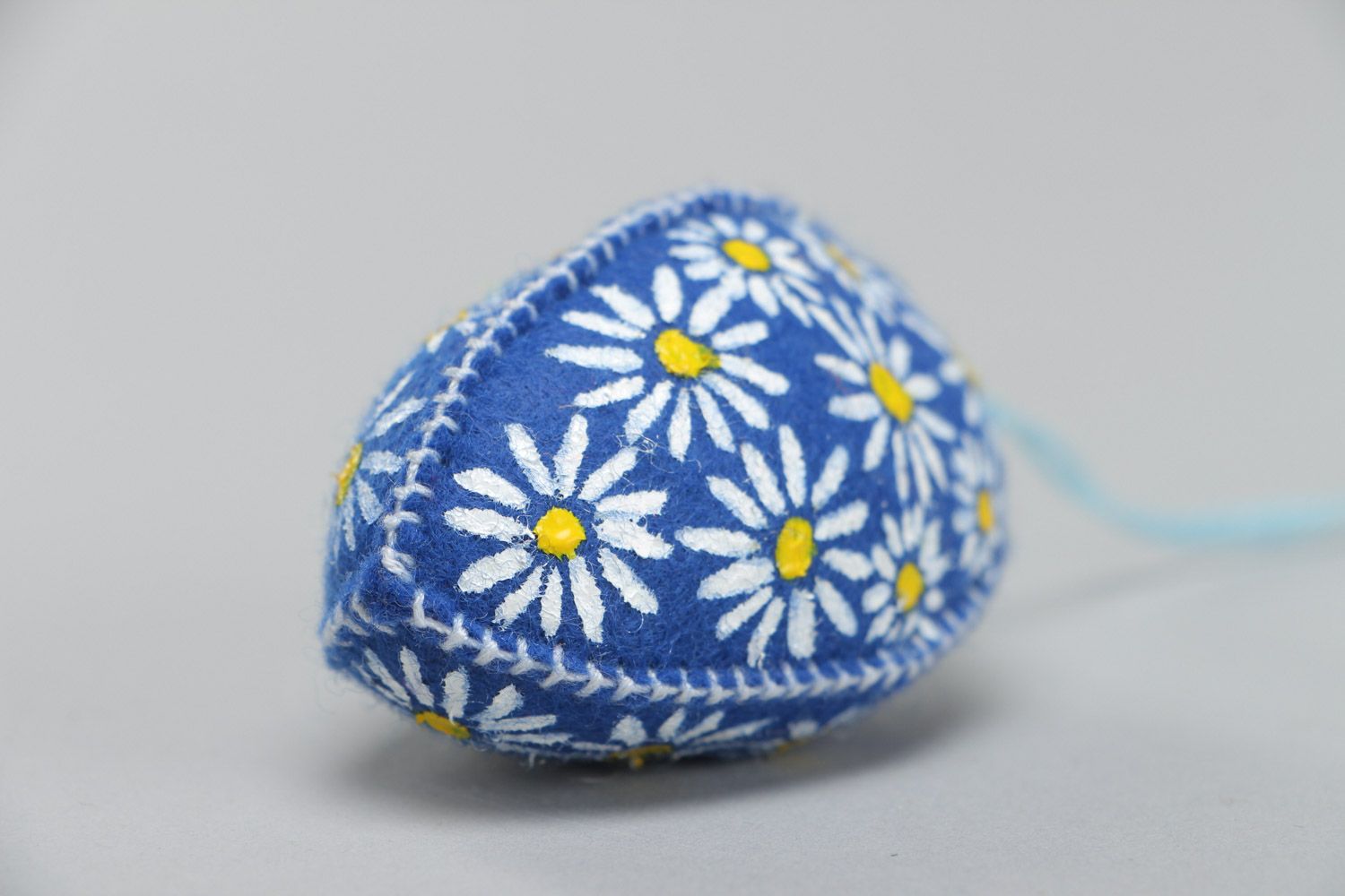 Handmade wall hanging Easter egg sewn of bright blue felt painted with flowers  photo 3