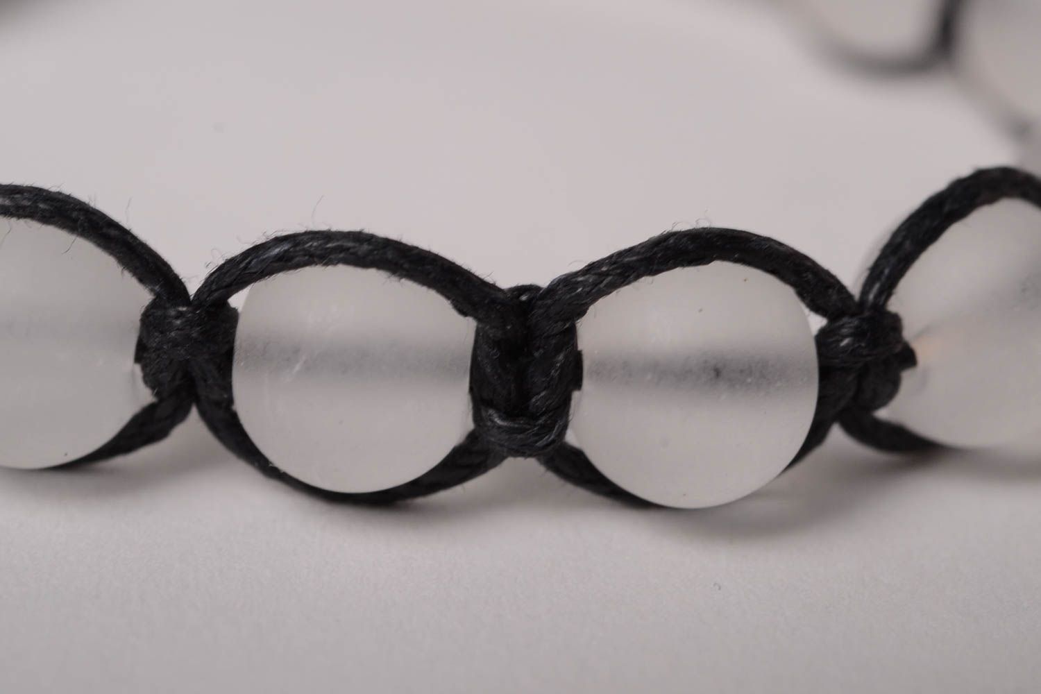 Transparent beads strand bracelet with black cord photo 4