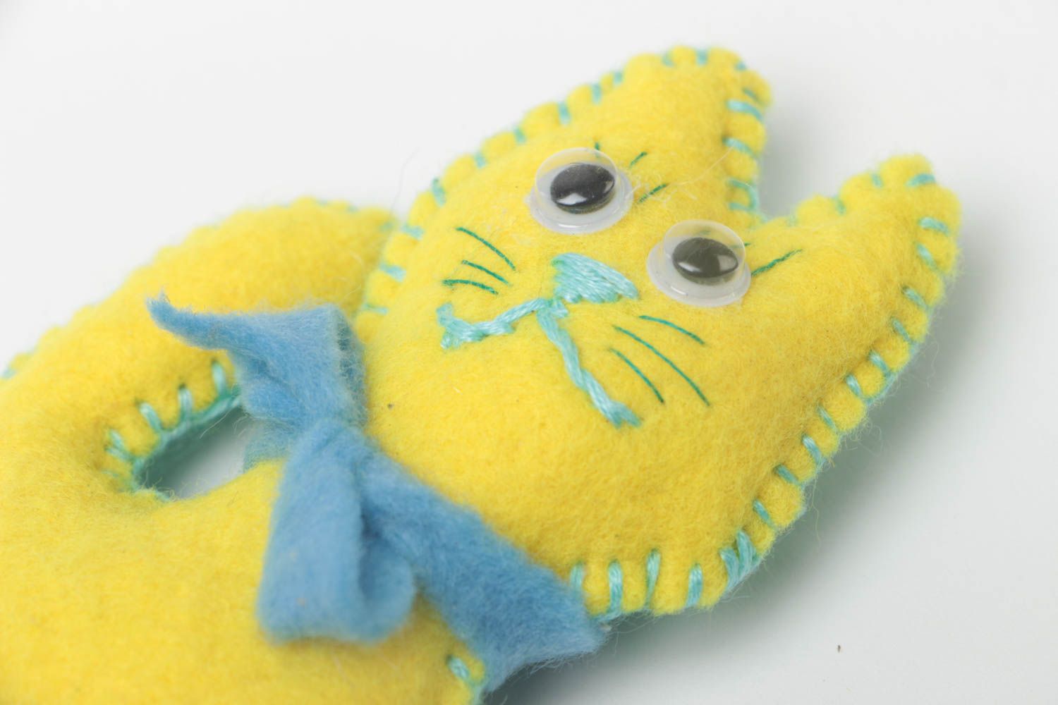 Handmade tiny felt soft toy designer yellow kitten with blue bow for kids photo 3