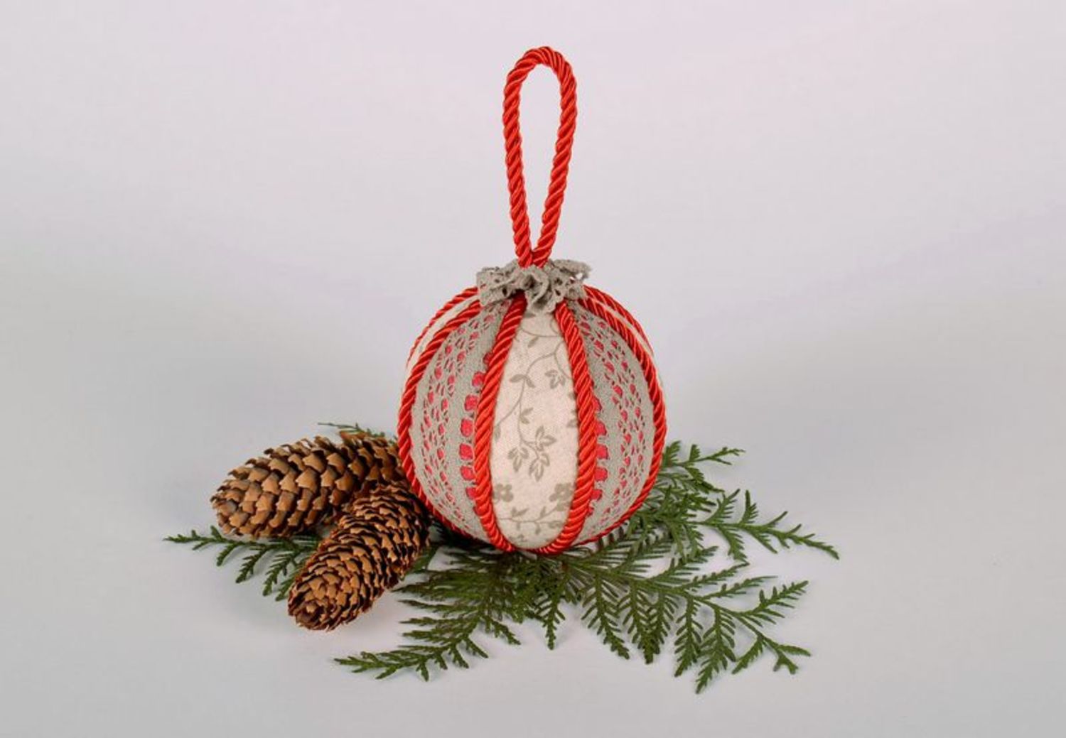 New Year's decoration with red cord ball photo 1