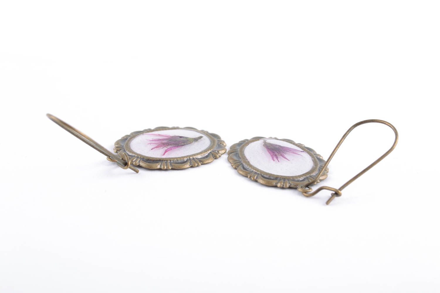 Oval earrings with real flowers coated with epoxy photo 5
