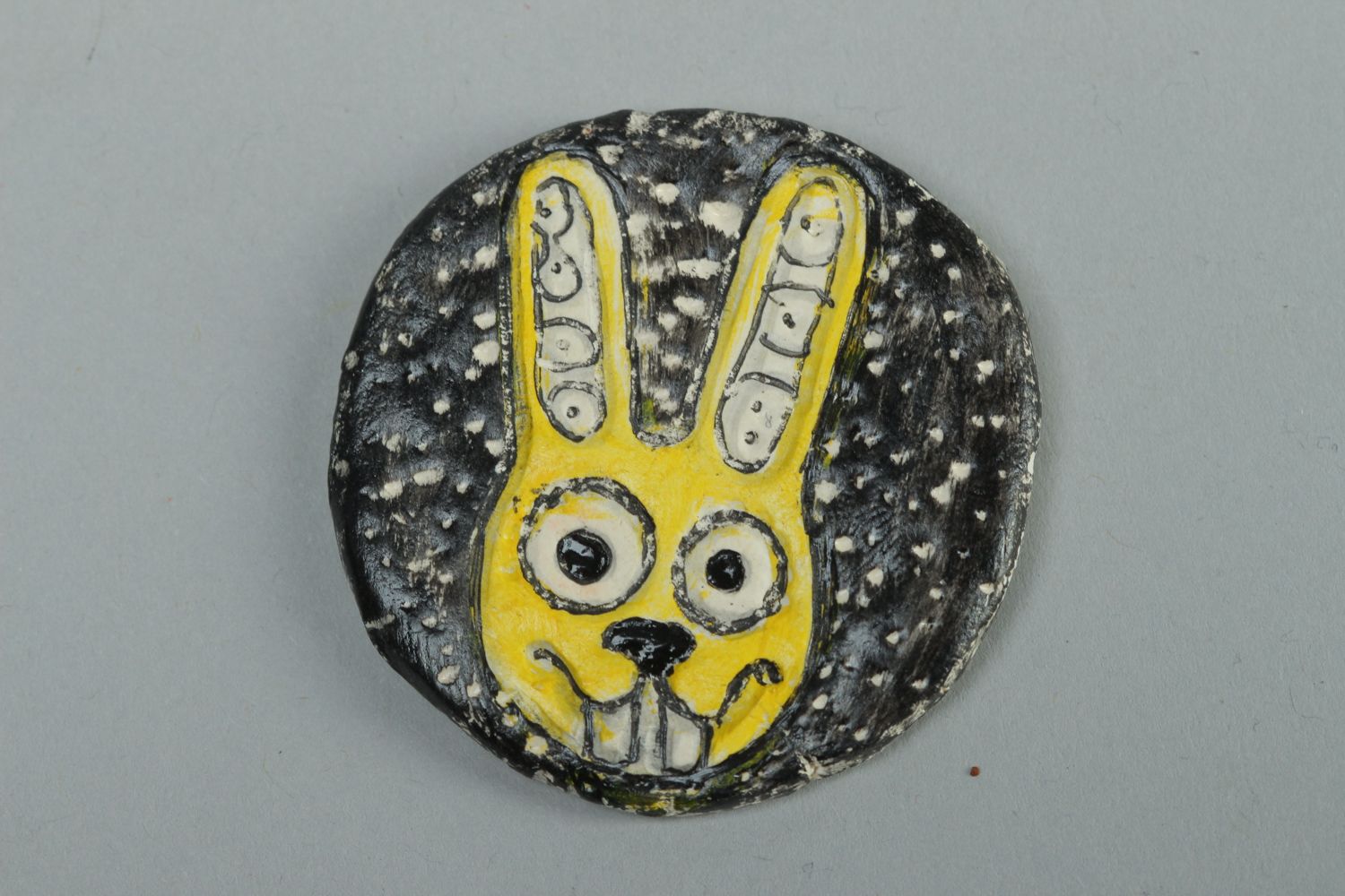 Round plastic fridge magnet with hare image photo 1