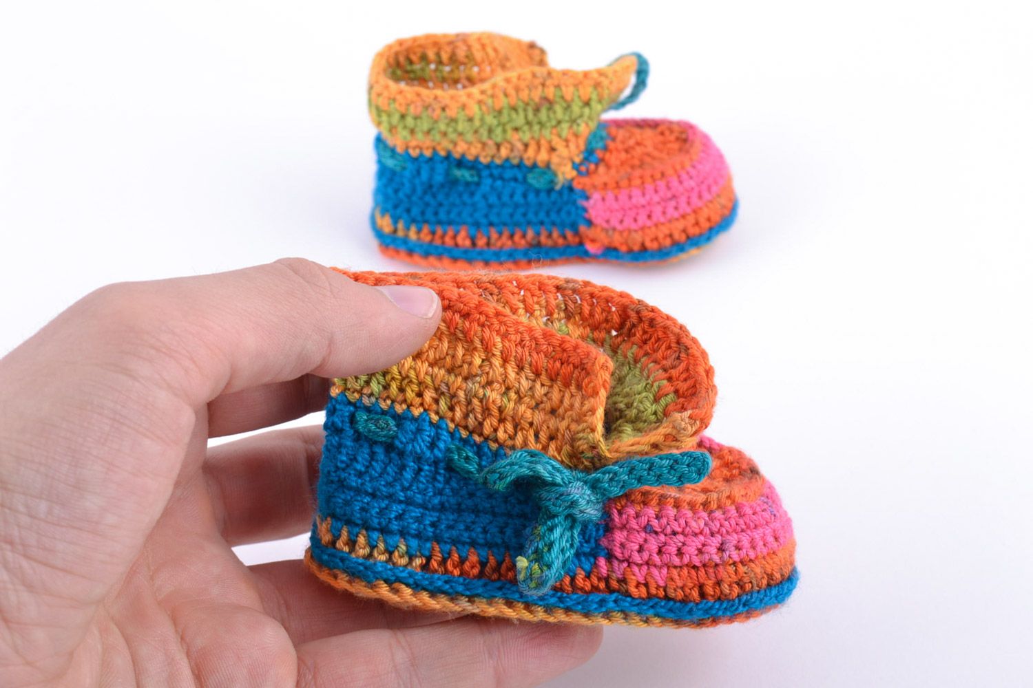 Bright colorful handmade warm baby shoes crocheted of natural wool for kids photo 2
