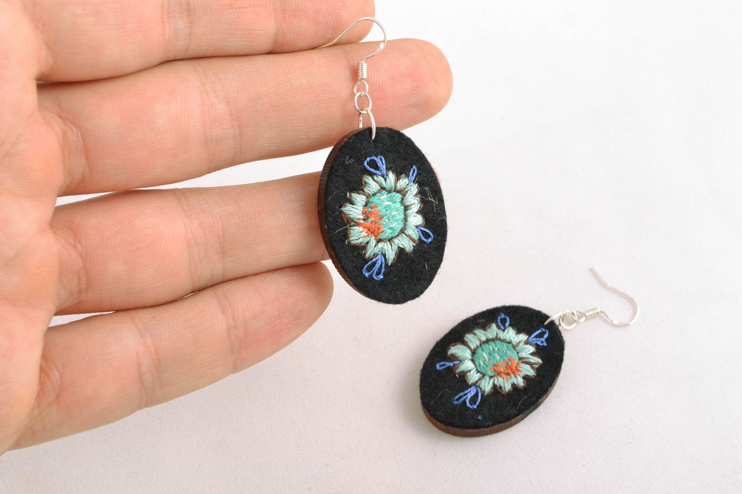 Oval earrings made of wood and felt with embroidery photo 2