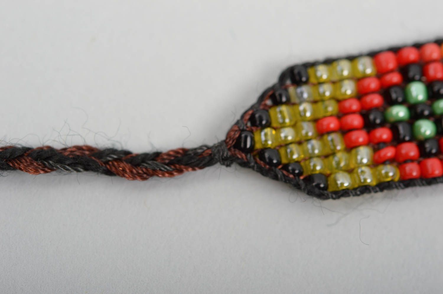Handmade beaded strand bracelet with green, red, black beads for women photo 3
