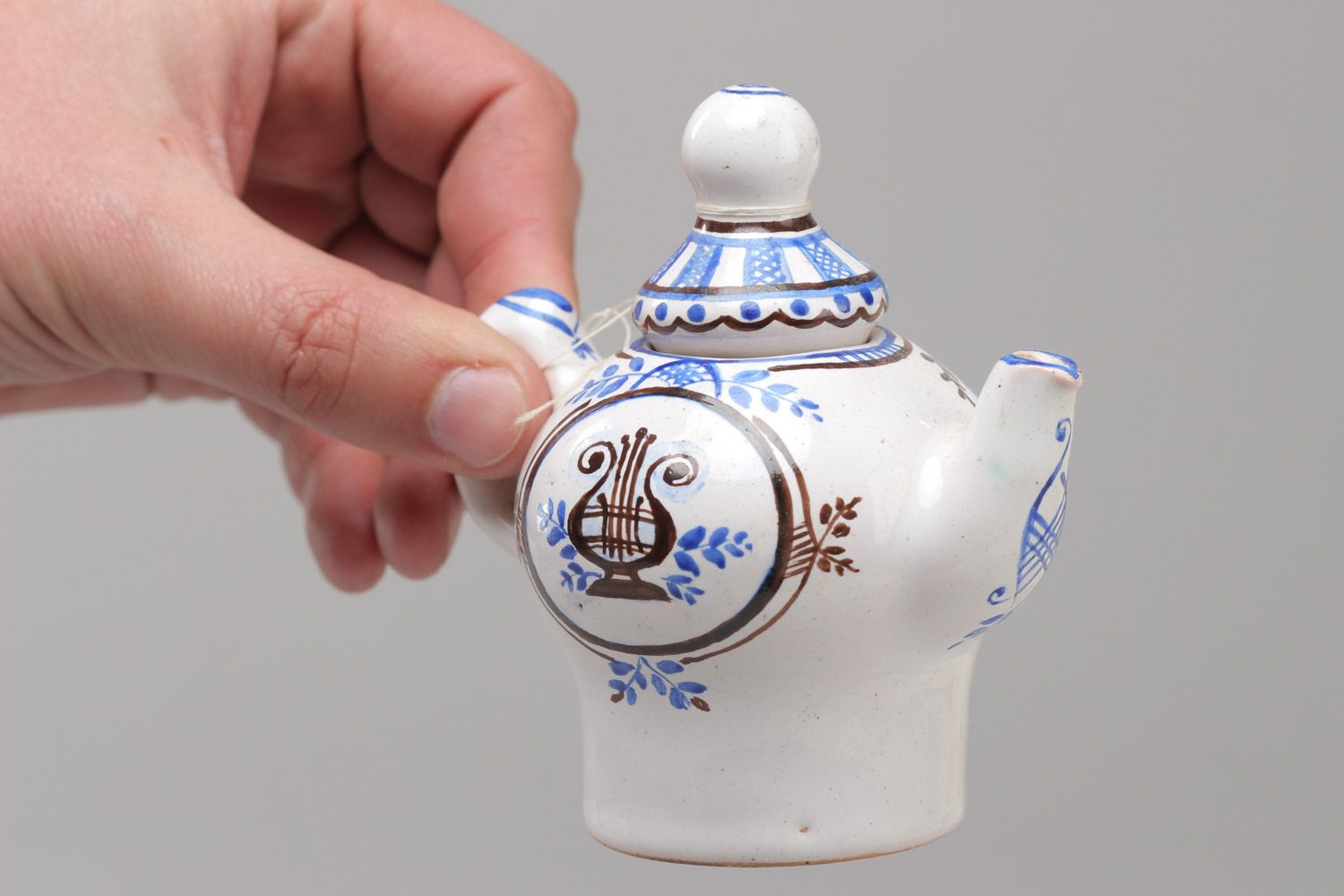 Керамический декоративный чайник с крышкой ручной работы покрытый эмалью фото 5