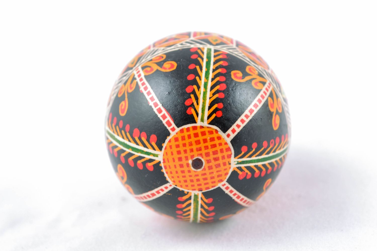 Painted chicken egg for Easter of black color with ornament photo 4