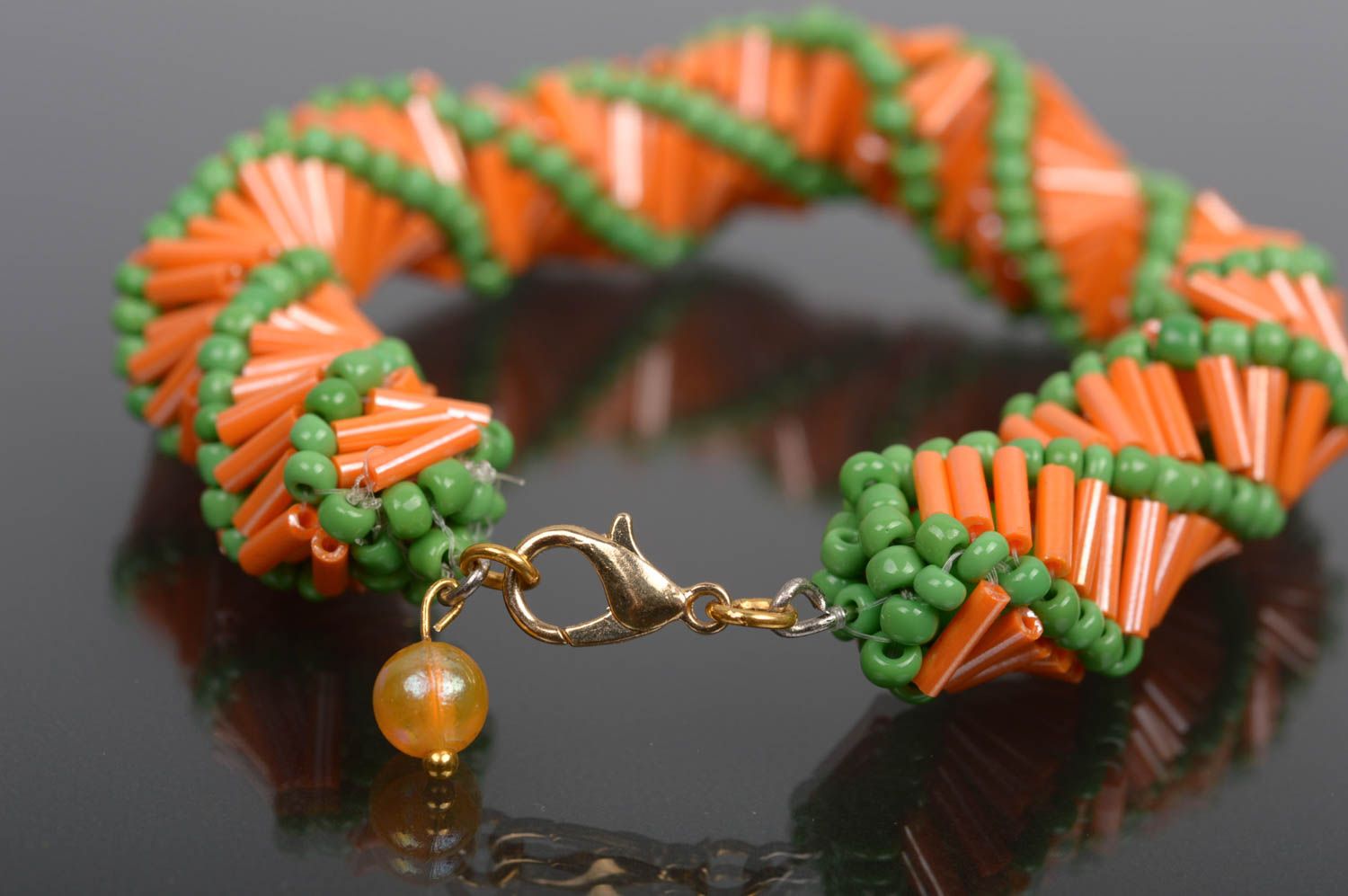 Handmade beaded cord bracelet made of orange and light green beads for women photo 3