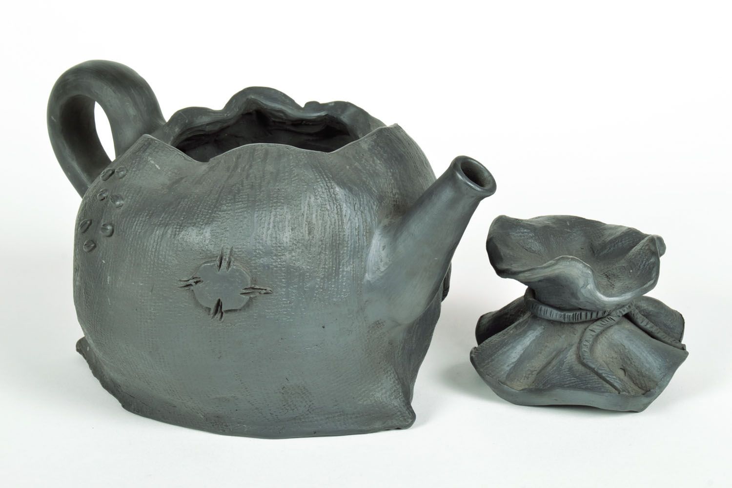 Bule de chá de cerâmica na forma de um saco foto 4
