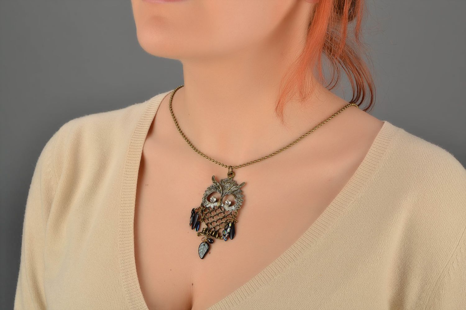 Handmade metal pendant in the form of owl with epoxy resin and Czech glass photo 2