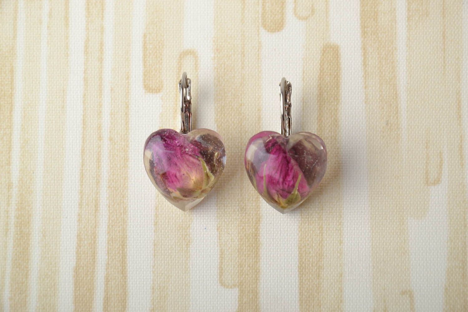 Heart-shaped earrings with natural flowers and epoxy resin photo 1