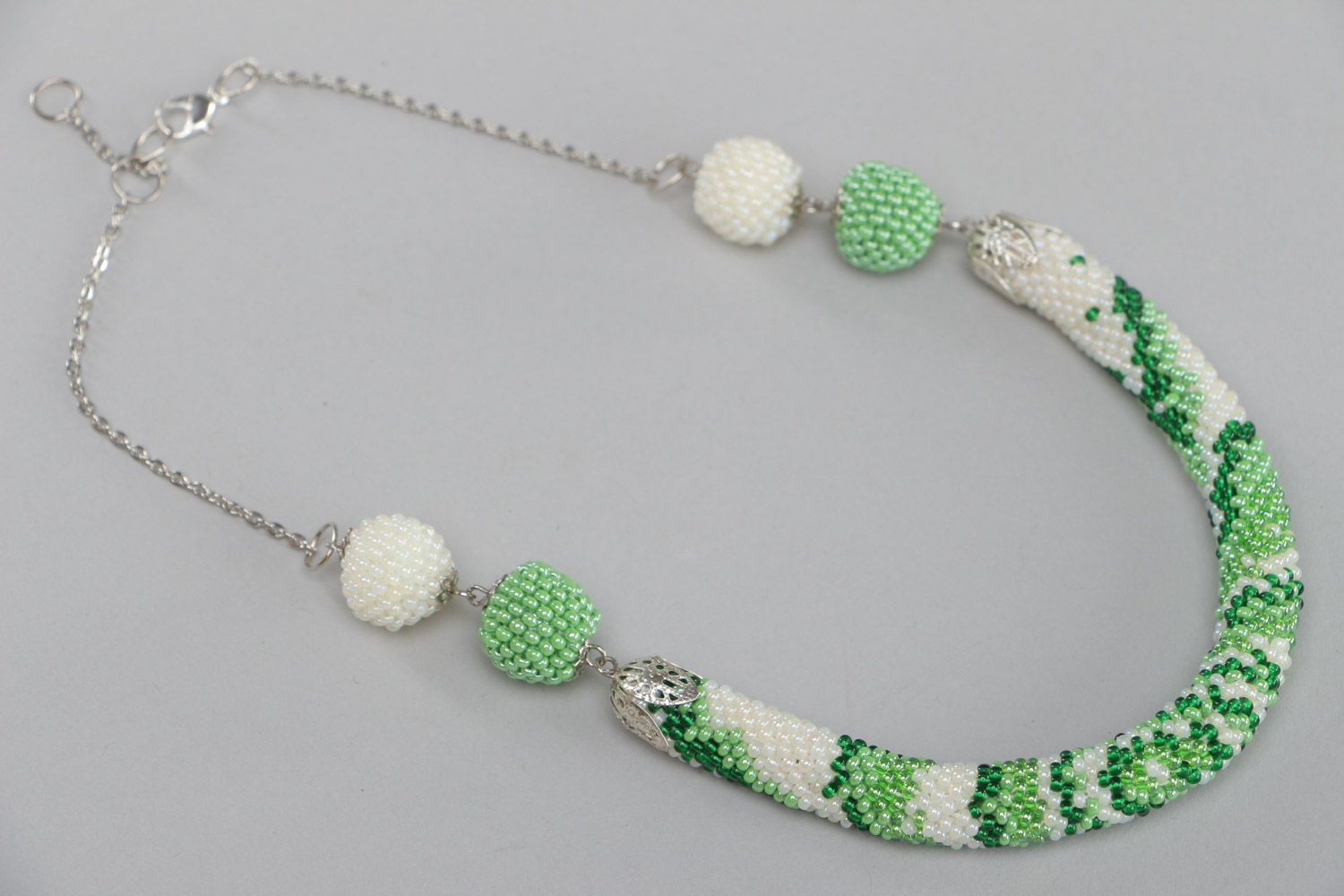 Unusual spring handmade Czech bead cord necklace of white and green colors photo 2