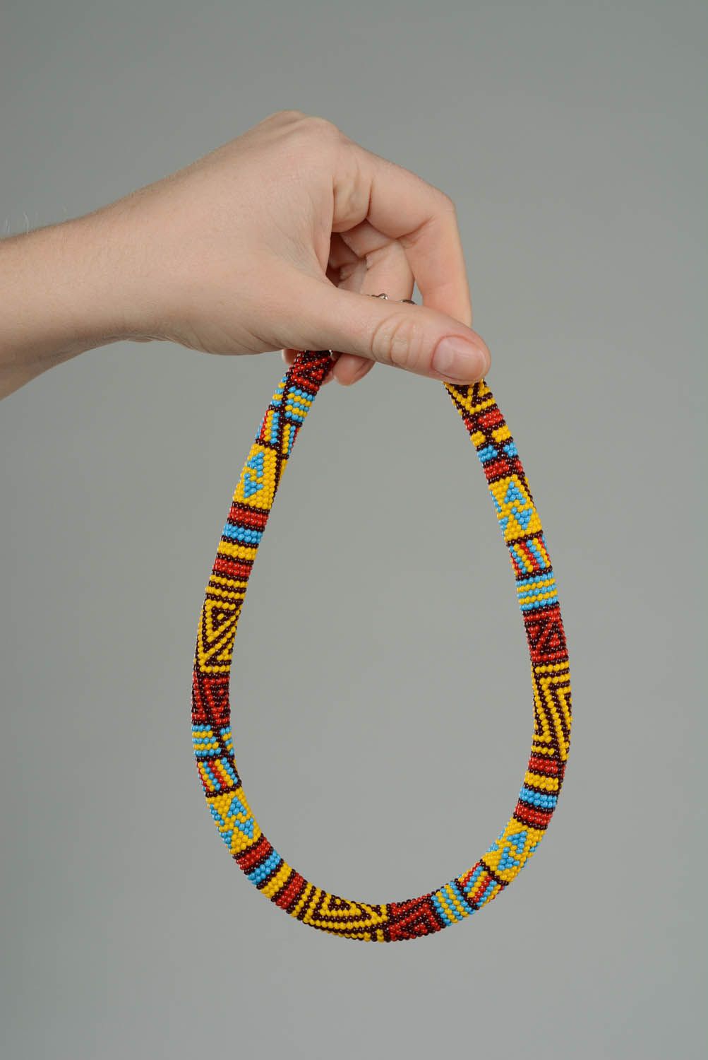 Beaded cord with African motifs photo 5