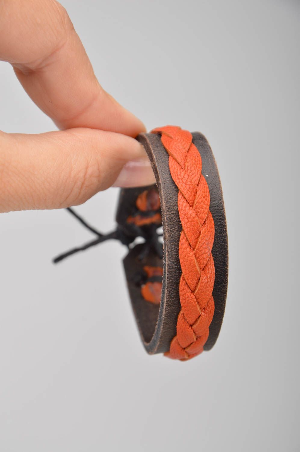 Handmade designer brown and orange genuine leather wrist bracelet with ties photo 3