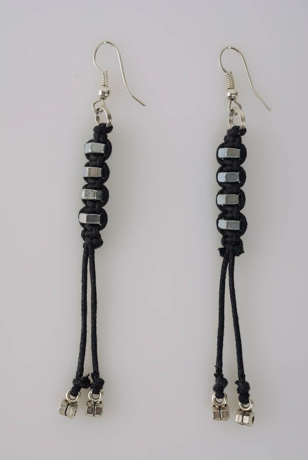 Handmade black designer macrame woven cord earrings with metal nuts photo 1