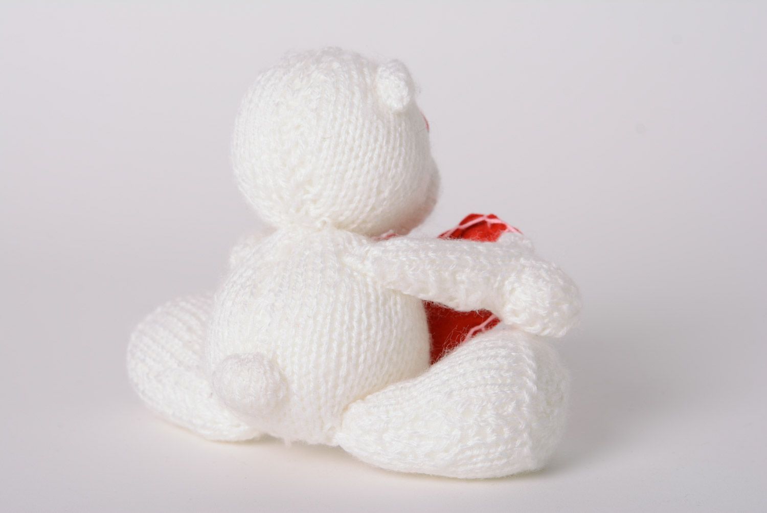 Small handmade soft knitted toy bear with red heart photo 4