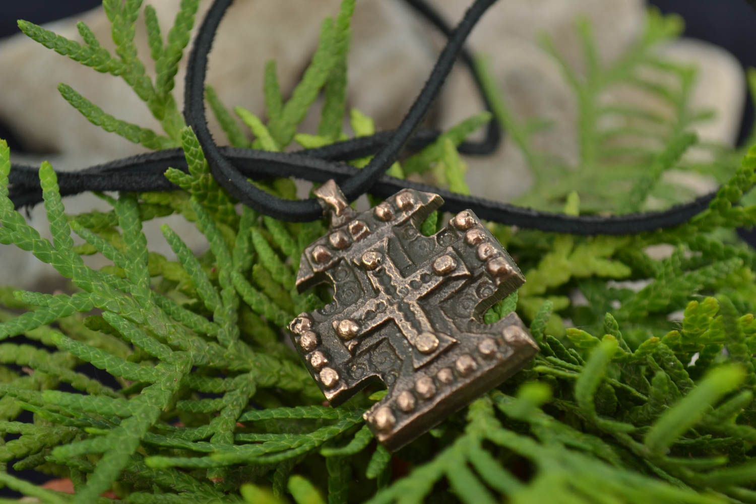 Small unusual next to skin handmade cross pendant cast of bronze on black cord photo 1