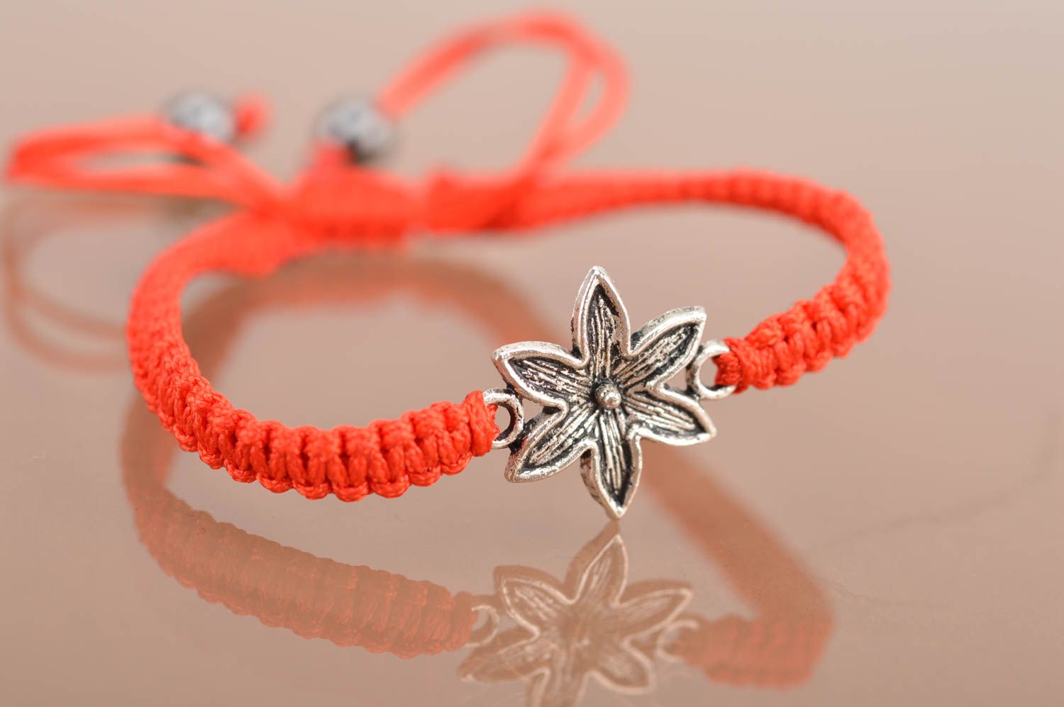 Beautiful red handmade design bracelet woven of silk threads with insert Flower photo 2