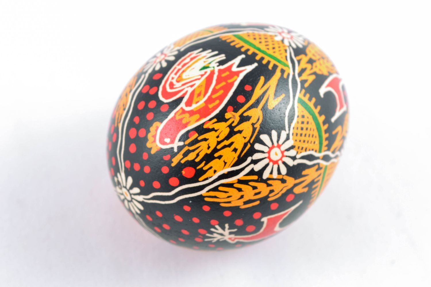 Handmade Easter egg with bright painting in Ukrainian style photo 4