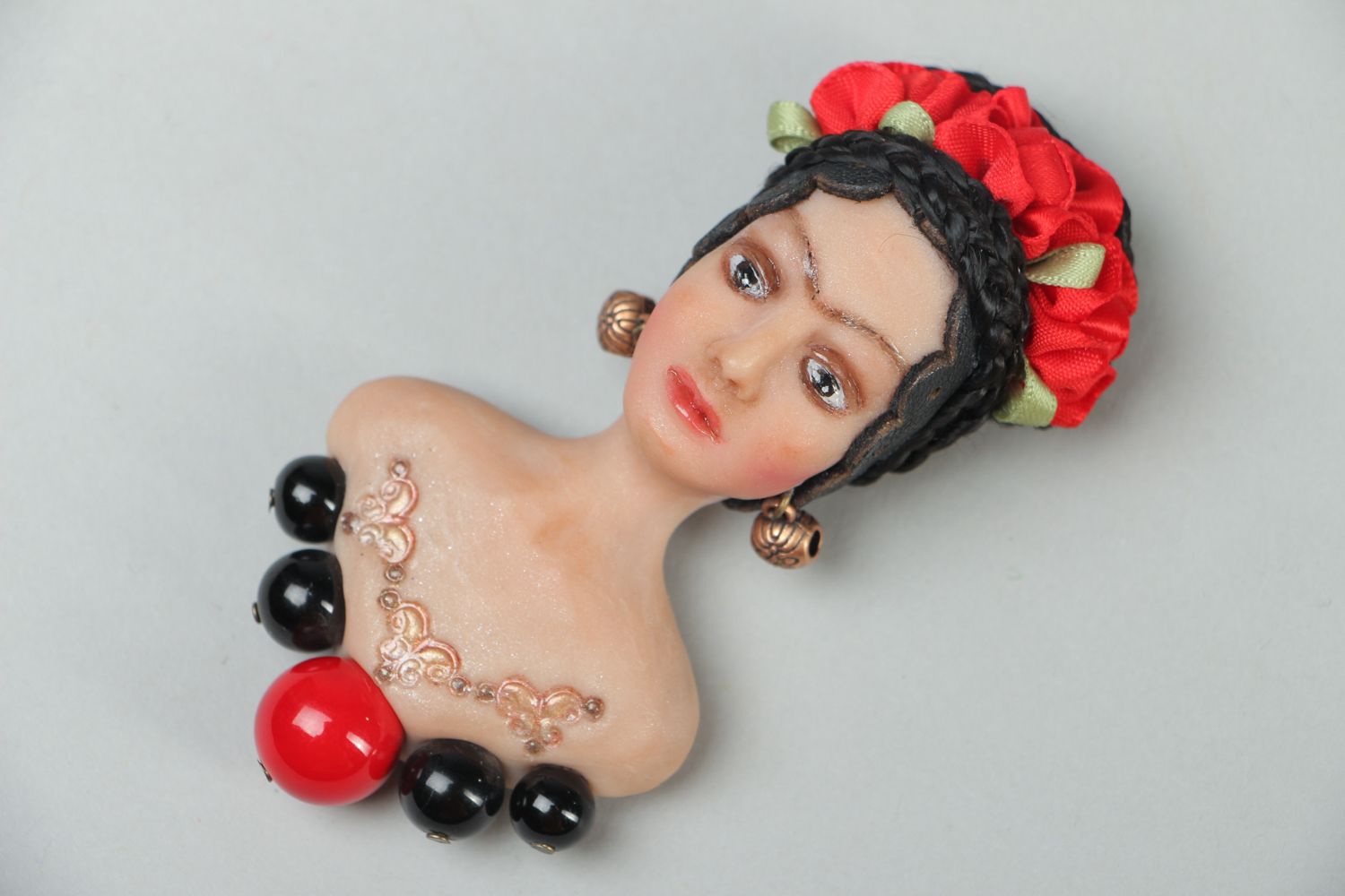 Polymer clay brooch in the shape of Frida Khalo photo 1