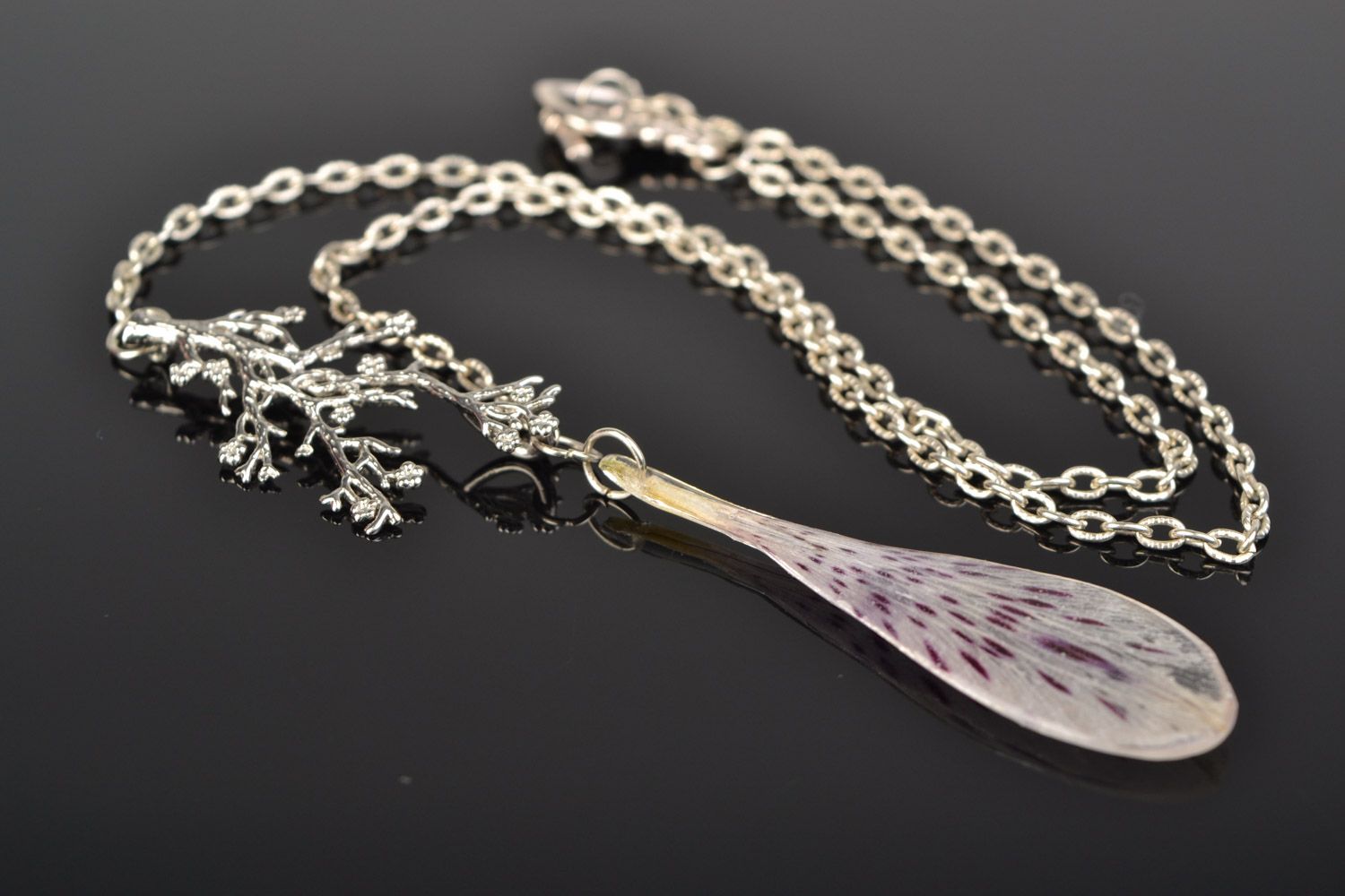 Elegant handmade pendant with alstroemeria petal in epoxy resin on metal chain photo 1