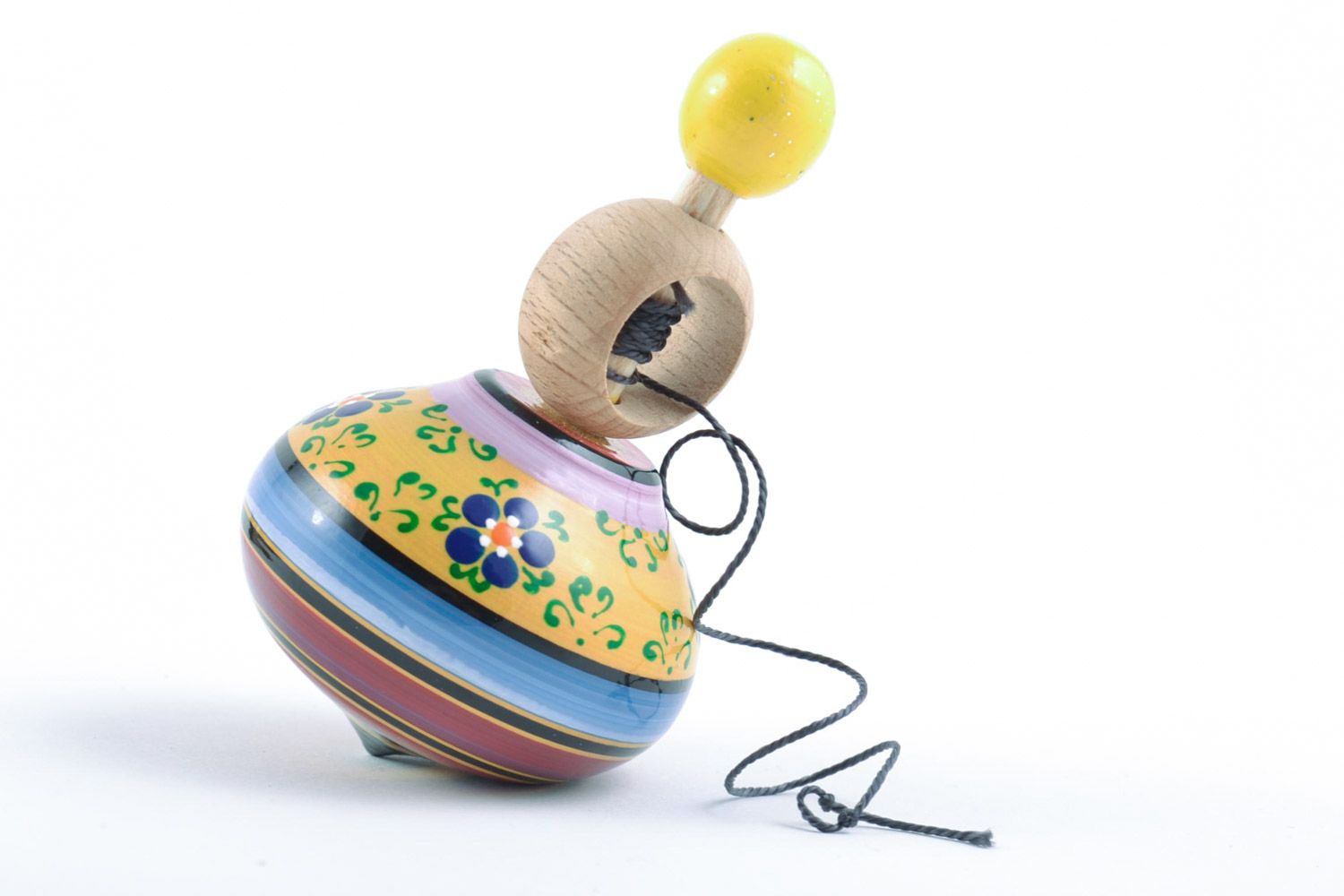 Маленький деревянный волчок ручной работы с росписью развивающая игрушка детская фото 5