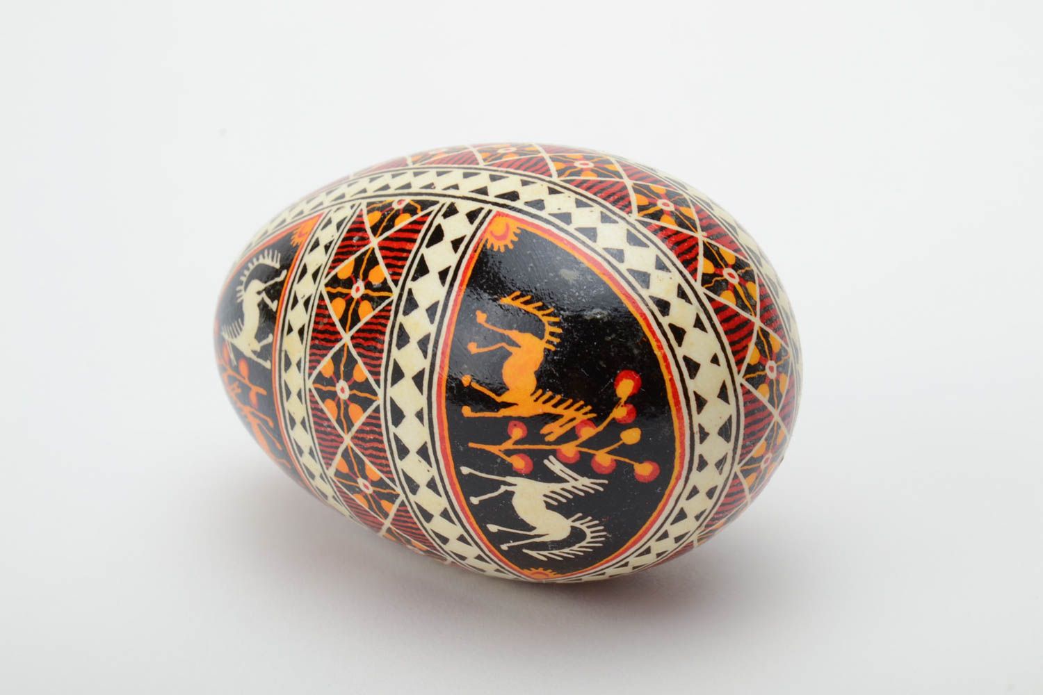 Handmade decorative art painted Easter egg traditional pysanka with horses image photo 4