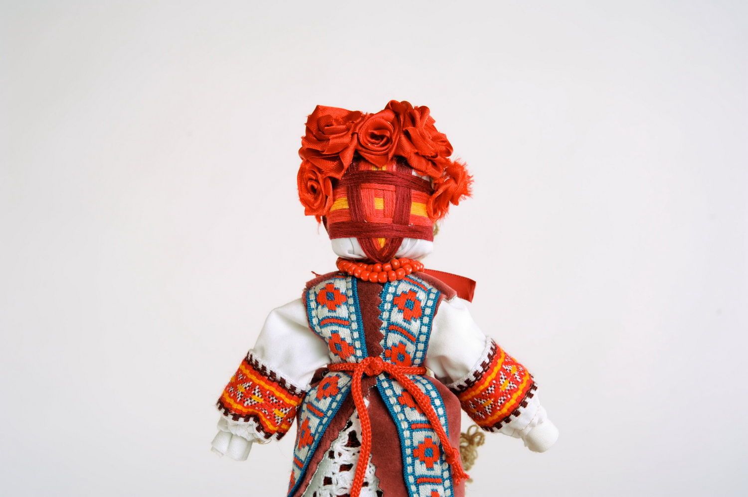 Red fabric doll photo 4