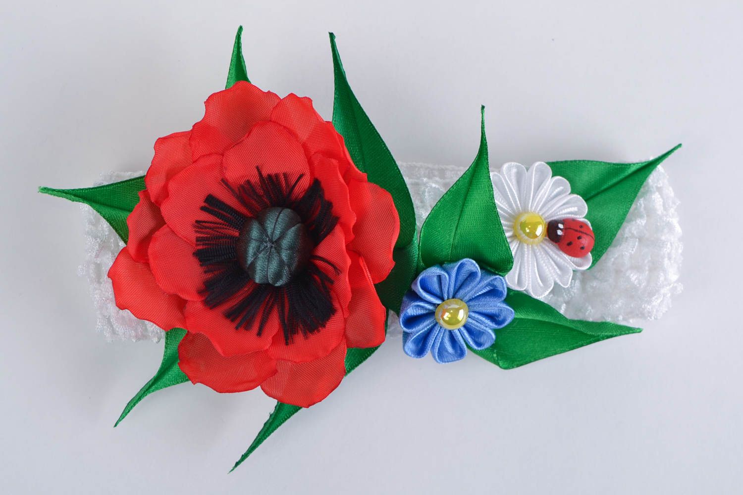 Handmade designer elastic headband with colorful kanzashi flowers for children photo 1