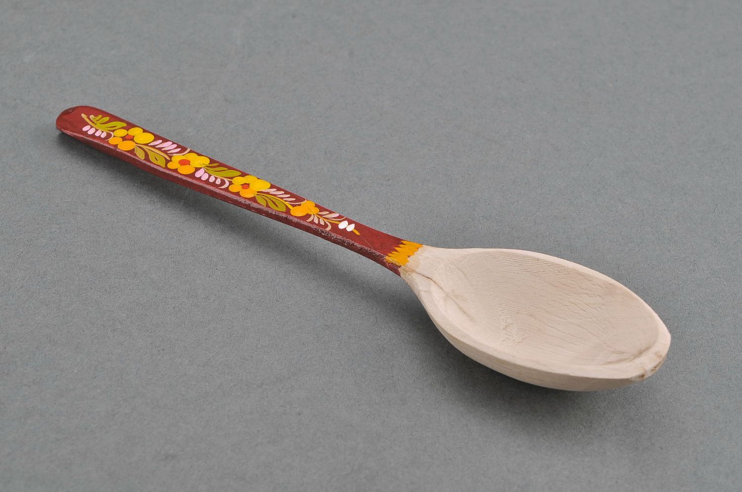 Wooden teaspoon with red handle photo 2