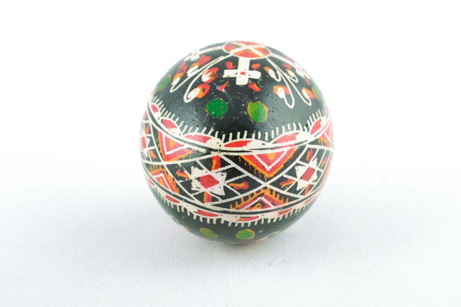Handmade Easter egg with cross-shaped ornament painted with wax and aniline dyes photo 5