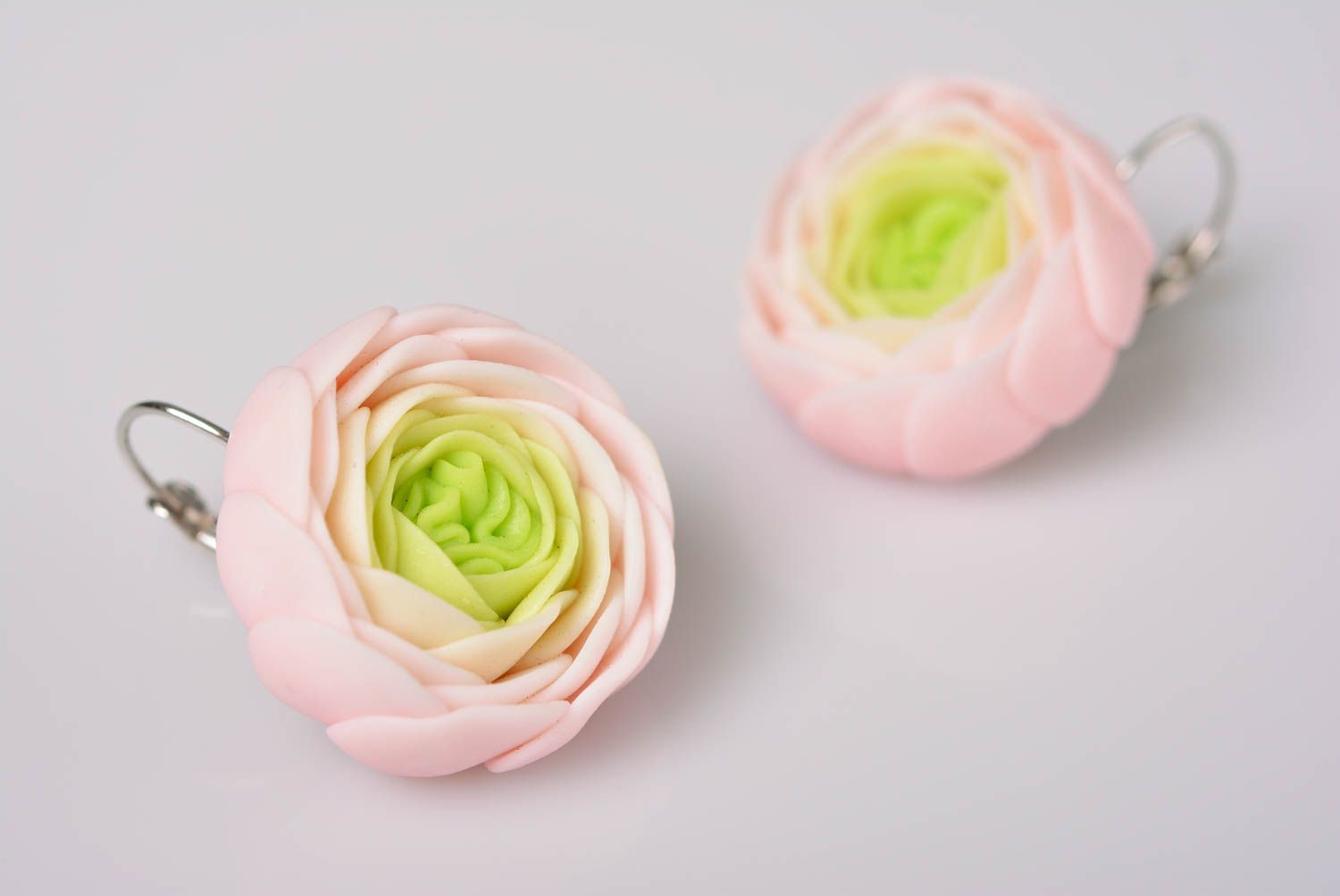 Handmade earrings with flowers made of polymer clay in the form of white buds photo 1