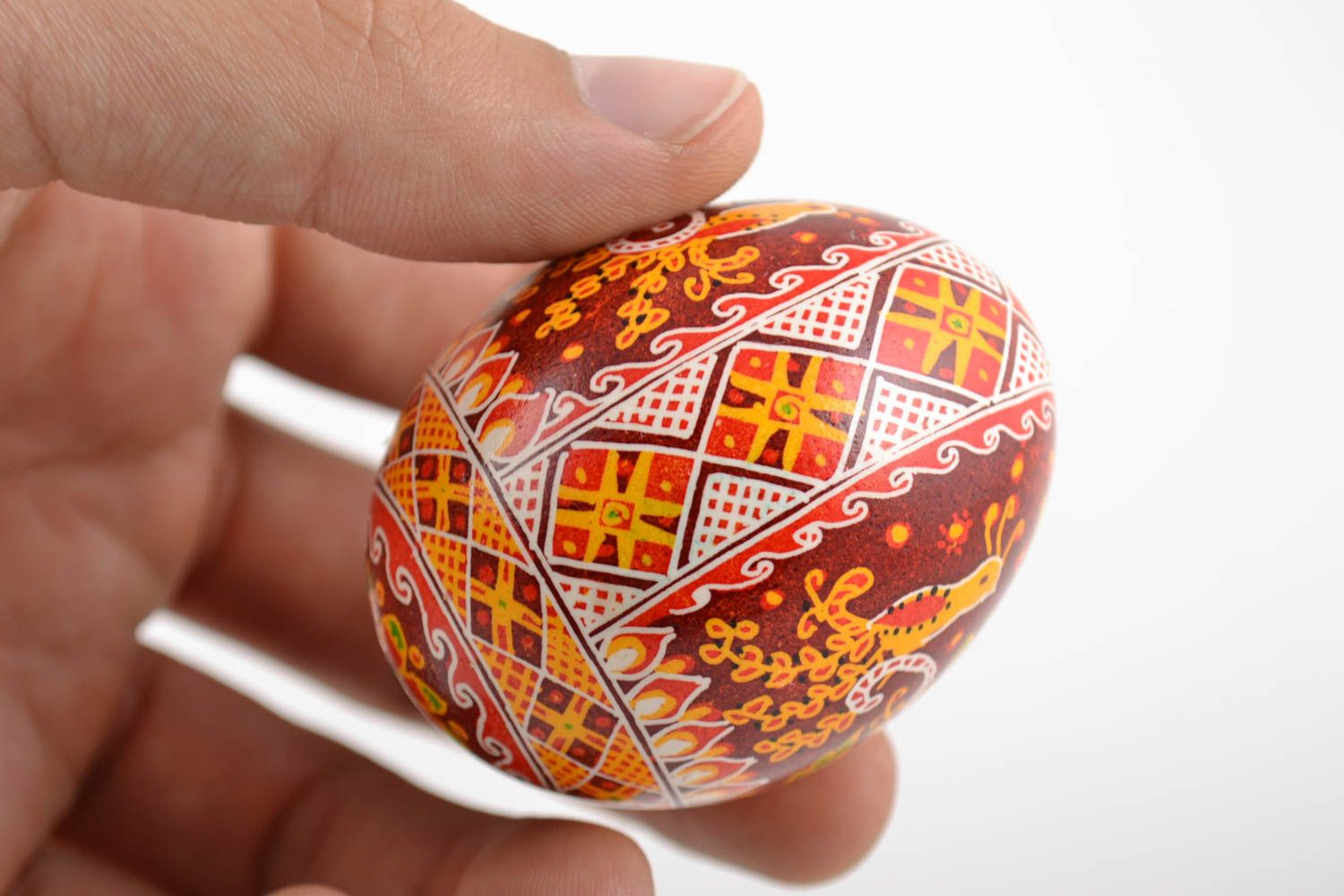 Beautiful red handmade painted Easter egg with ornaments photo 2